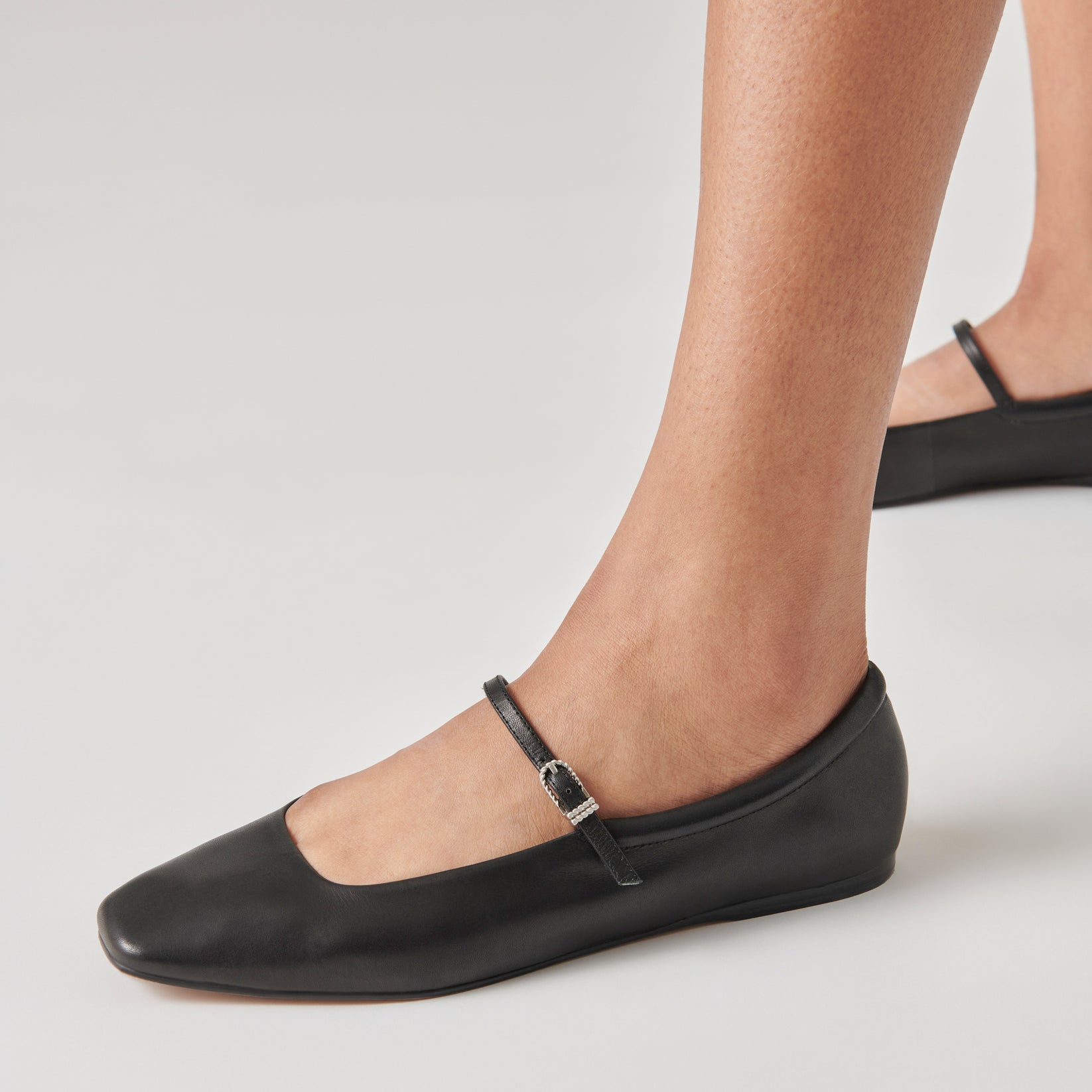 Black leather ballet flats