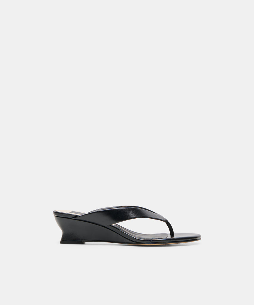 EVARLY Black Leather Round-Toe Thong Wedges | Dolce Vita